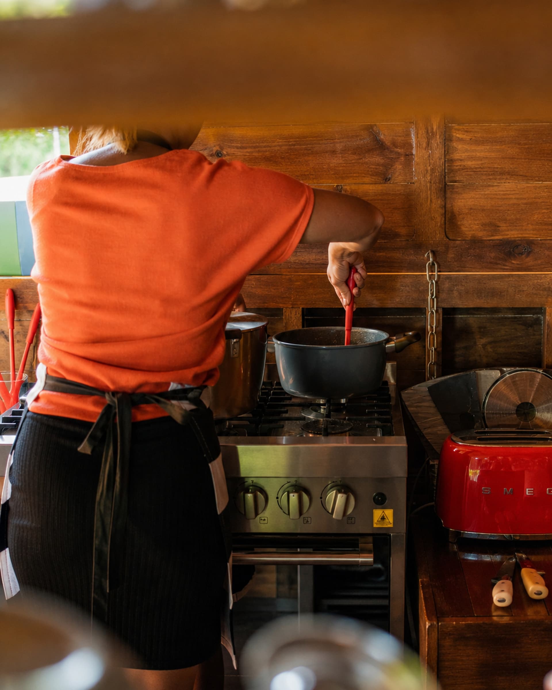 Chef preparing farm-to-table dishes with fresh local ingredients at Blå Bar Restaurant
