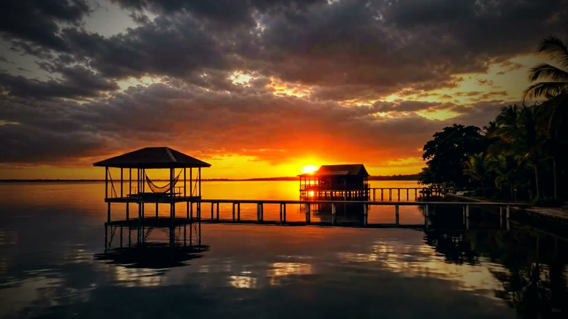 Arriving at Dolphin Blue Paradise eco-resort by boat over calm waters in Bocas del Toro, Panama